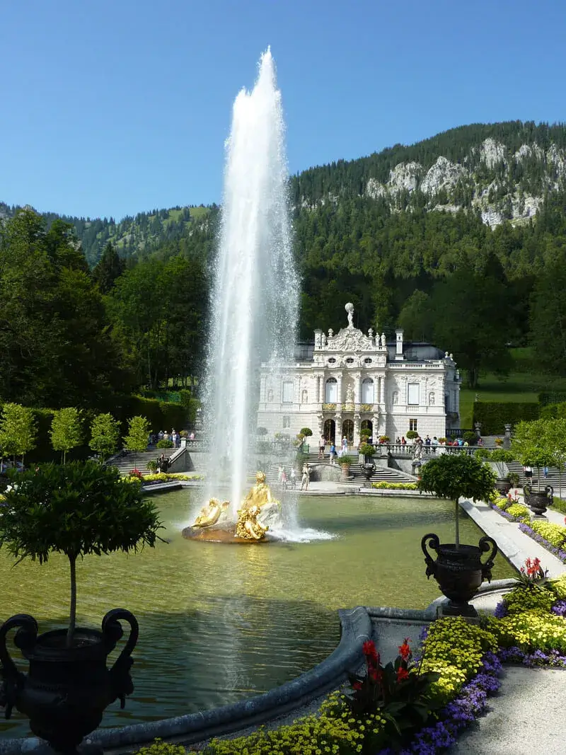 The baroque style estate of Linderhof with fountain and pool in front